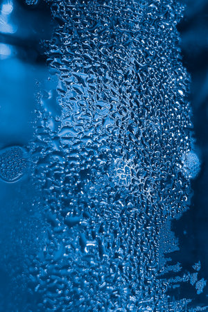 texture of frozen water drops cool ice glassの写真素材