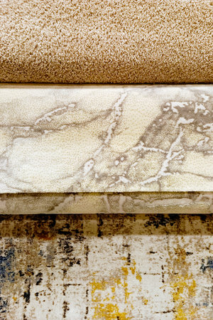 Carpeting and other materials sold in a store. Concept of trade, business, interior. Vertical photo.の写真素材