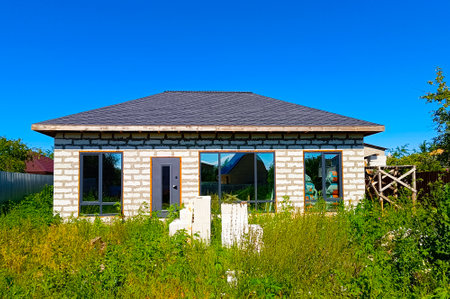 A white brick country house under construction.の写真素材