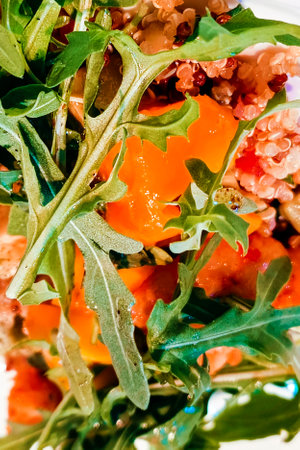 A tasty and healthy dish with sprouted grains, mango and herbs.の写真素材