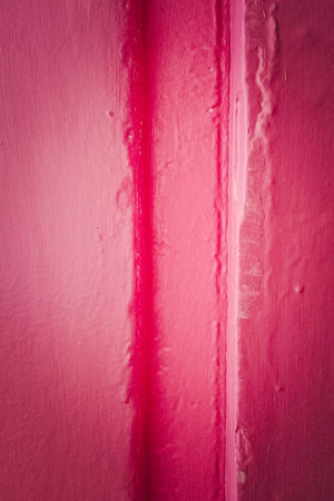 Old pink wood texture background. Vertical photo.の写真素材