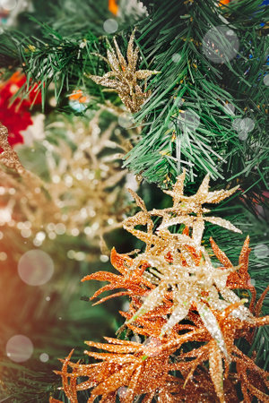 Beautiful shiny decorations for decorating a Christmas tree. Bokeh, snowflakes.の写真素材