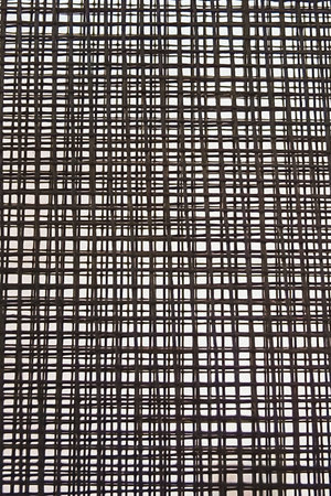Black and white background from a checkered with a pattern.の写真素材