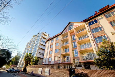 Sochi, RUSSIA - January 2, 2025: Street with multi-story residential buildings in Sochi.の写真素材