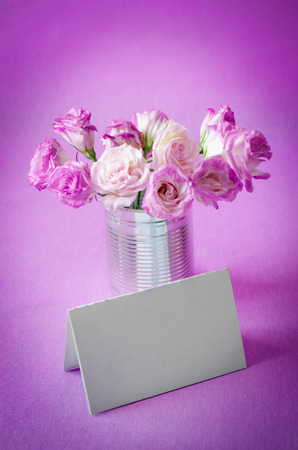 bouquet of pink flowers on a purple backgroundの写真素材