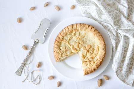 pie patterned in the form of flowers with custard on a white background (the Basque cake).の写真素材