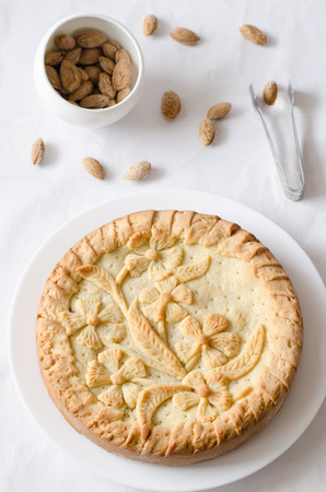 pie patterned in the form of flowers with custard on a white background (the Basque cake).の写真素材
