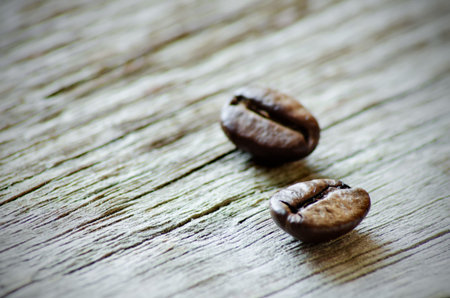 coffee beans on a wood background
