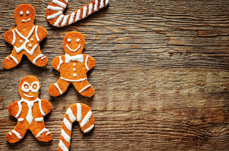 ginger biscuit on a dark wood background. tinting. selective focus