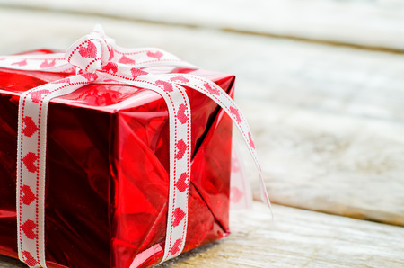 Valentine's day background with gift on a white wood background. tinting. selective focusの写真素材