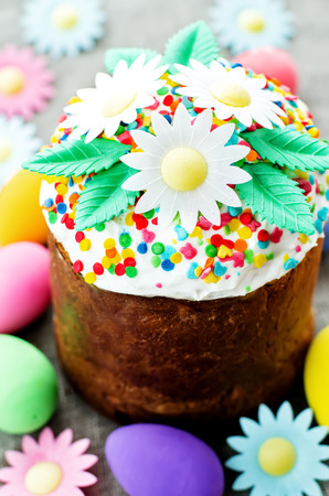 Easter cake with white flowers on a dark background. tinting. selective focusの写真素材