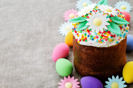Easter cake with flowers on a wood background. tinting. selective focus
