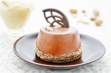 cake with berry compote and peanut mousse. tinting. selective focusの写真素材