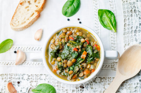 Lentil spinach soup on a white background. the toning. selective focusの写真素材