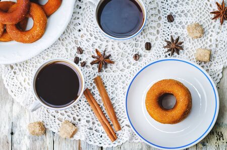 pumpkin donuts on a white wood backgroundの写真素材