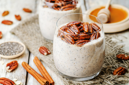 oat cinnamon Chia seed pudding with honey pecan. the toning. selective focusの写真素材