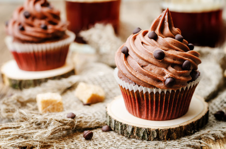 chocolate cupcakes with chocolate frosting and chocolate chipsの写真素材