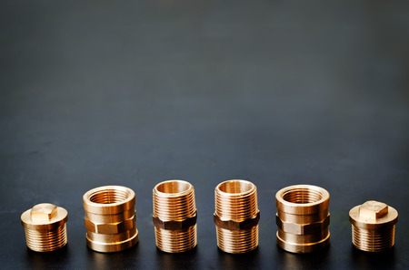 tools plumbing on a black background. tinting. selective focusの写真素材