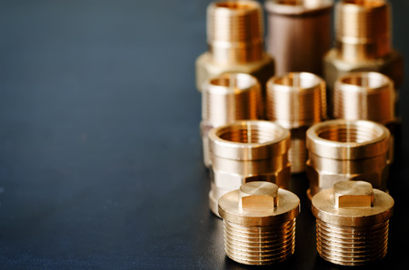 tools plumbing on a black background. tinting. selective focusの写真素材