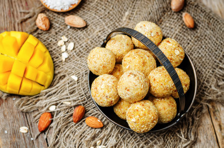 raw vegan mango coconut almond balls. toning. selective focusの写真素材