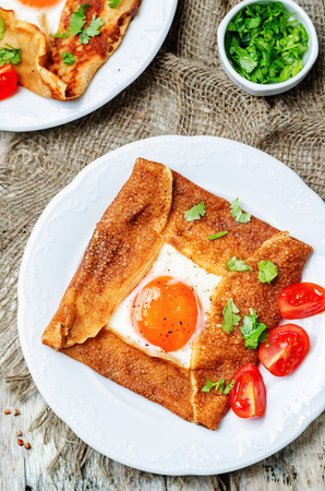 Buckwheat crepes with cheese and egg. toning. selective focusの写真素材