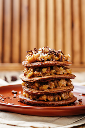 German chocolate pancakes with coconut and chocolate. toning. selective focusの写真素材