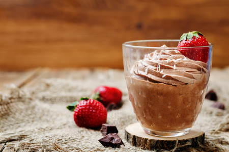 chocolate mousse with strawberries and coconut. toning. selective focusの写真素材