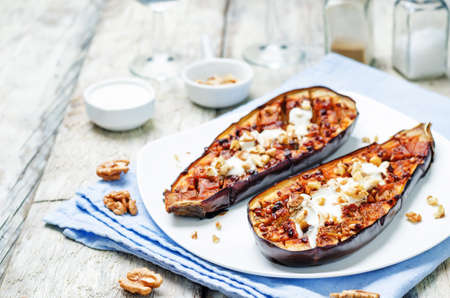roasted spicy eggplants with Greek yogurt walnuts topping. toning. selective focusの写真素材