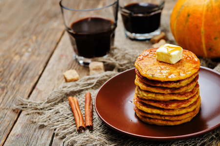 Banana Pumpkin Pancake with butter and maple syrup. toning. selective focusの写真素材