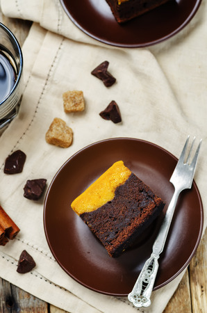 Pumpkin Brownies on wood background. toning. selective focusの写真素材