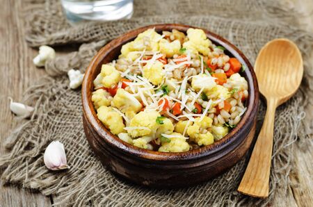 cauliflower carrot barley porridge. toning. selective focusの写真素材