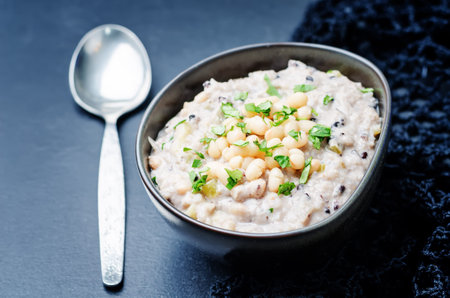 Cashew cream rice stew with white beans and wild rice. toning. selective focus