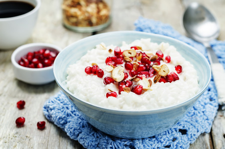 Coconut rice with pomegranate and granola. toning. selective focusの写真素材