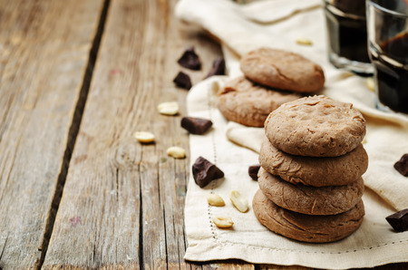 chocolate peanut butter cookies on a wood background. the toning. selective focusの写真素材