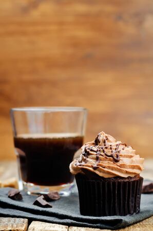chocolate cupcakes with chocolate cream cheese frosting. the toning. selective focusの写真素材