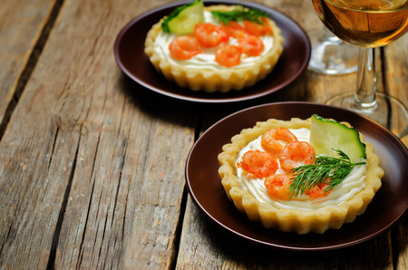 Shrimp cream cheese mousse dill cucumber tartlet. toning. selective focusの写真素材