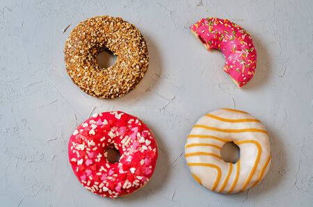 Donuts on a light stone background. toning. selective focus の写真素材