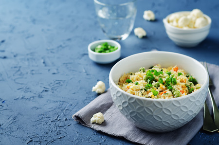 Carrot green pea fried cauliflower. Diet concept. toning. selective focusの写真素材