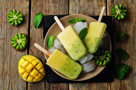 Kiwi mango ice cream with fruits and ices. toning. selective focusの写真素材