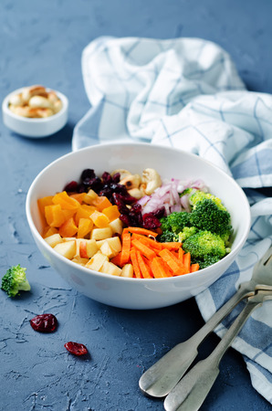Broccoli carrot cashews apple salad with honey greek yogurt dressing. toning. selective focusの写真素材