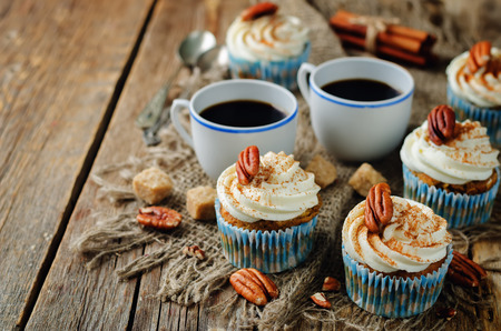 Carrot cinnamon cupcakes with pecan. toning. selective focusの写真素材