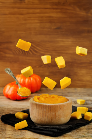 Pumpkin puree with fresh flying slices. toning. selective focusの写真素材