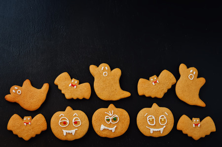 Halloween cookies on a black background. Copy space. toning. selective focusの写真素材