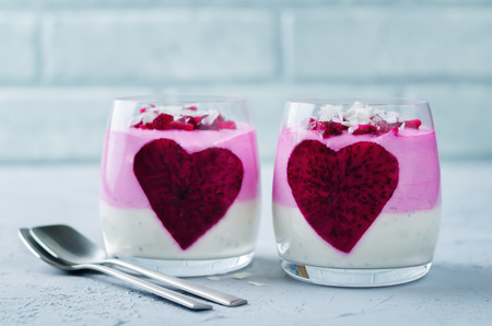 Greek yogurt pitaya Chia seeds parfait on a stone background. toning. selective focusの写真素材