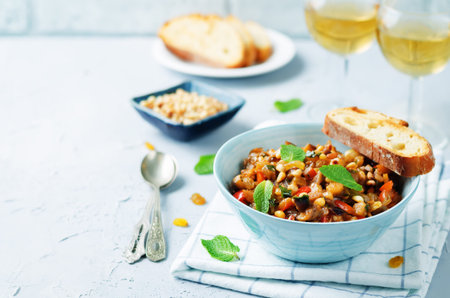 Sicilian Eggplant pine nuts Caponata. toning. selective focusの写真素材