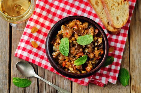 Sicilian Eggplant pine nuts Caponata. toning. selective focusの写真素材