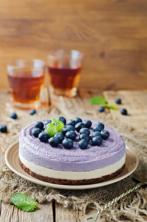 Raw vegan Blueberry Cashews cake on a wood background. toning. selective focusの写真素材