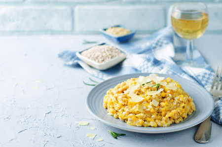 Roasted pumpkin and Pearl Barley Risotto on a stone background. toning. selective focusの写真素材