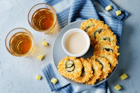 Jalapeno Cheese Crisps with Greek Yogurt Pepper Sauce on a stone background. toning. selective focusの写真素材