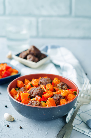Pumpkin sweet potato Bell pepper stew with meatballs. toning. selective focusの写真素材